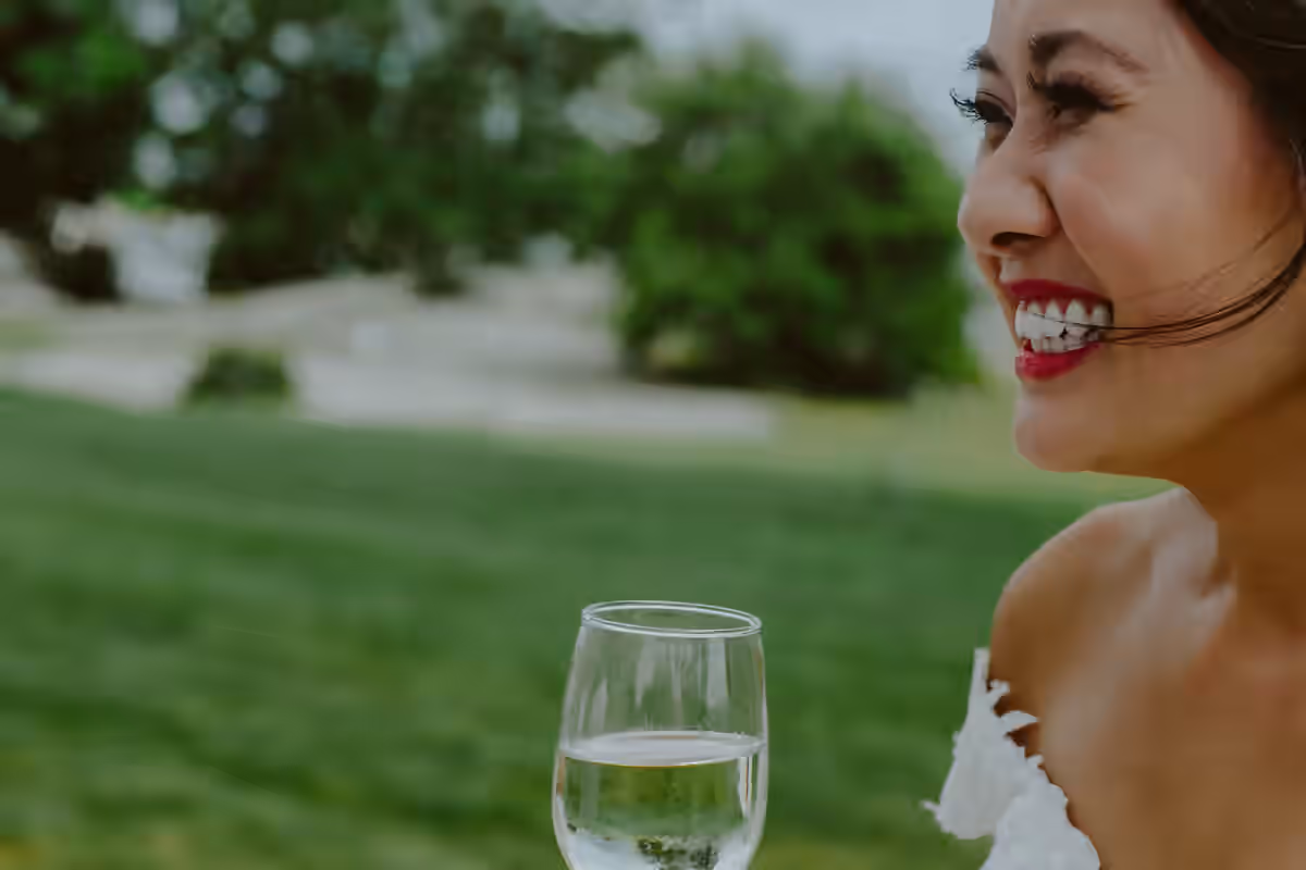 Tiffanie smiling on her wedding day.